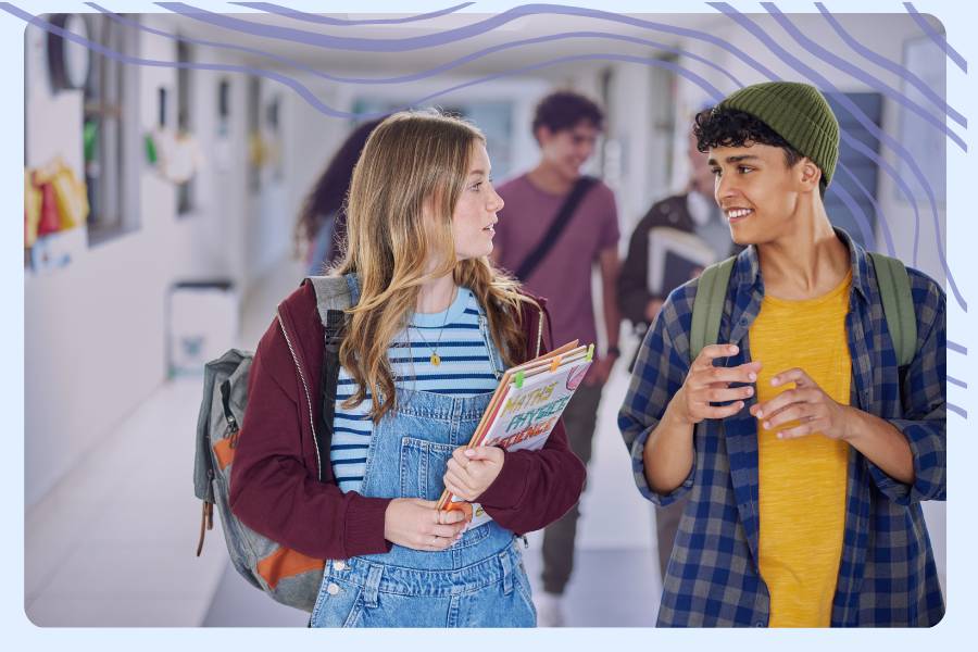 Teens walking in the school hallway